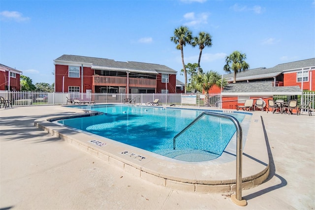 8220 12th Way N Unit G, Saint Petersburg, FL 33702 - community pool featuring a patio area