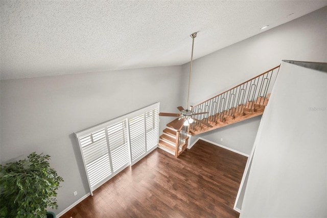 2581 Countryside Blvd Unit 2309, Clearwater, FL 33761 - foyer featuring wood finished floors, baseboards, ceiling fan, and a textured ceiling