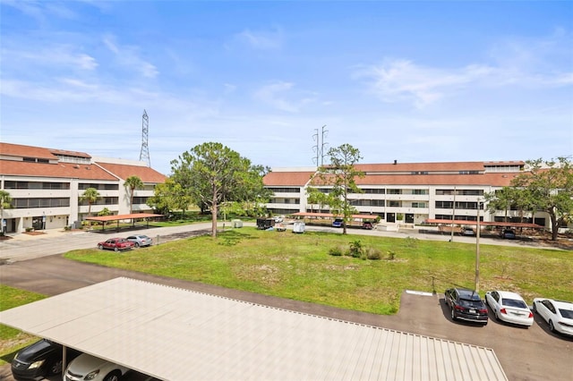 2581 Countryside Blvd Unit 2309, Clearwater, FL 33761 - view of building exterior with uncovered parking