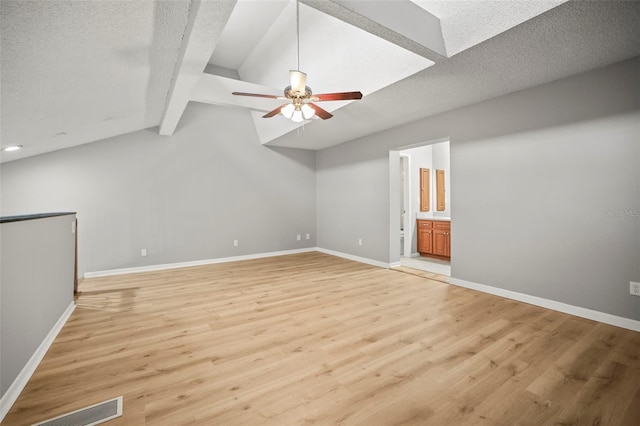 2581 Countryside Blvd Unit 2309, Clearwater, FL 33761 - unfurnished room with light wood-type flooring, a ceiling fan, baseboards, a textured ceiling, and recessed lighting