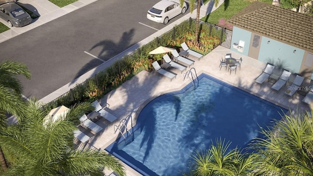 234 SE 27th St, Ruskin, FL 33570 - community pool with a patio area
