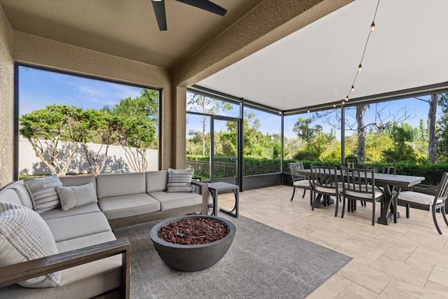 32193 Watoga Loop, Wesley Chapel, FL 33543 - sunroom with outdoor dining area, an outdoor living space, and ceiling fan