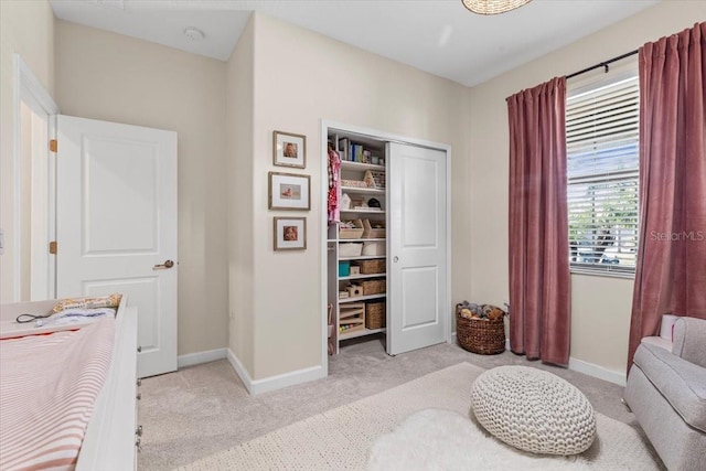 32193 Watoga Loop, Wesley Chapel, FL 33543 - bedroom featuring light colored carpet and a closet