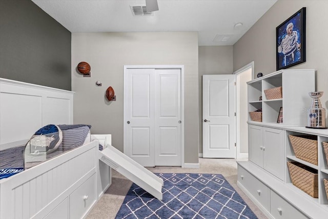 32193 Watoga Loop, Wesley Chapel, FL 33543 - bedroom with light colored carpet and a closet