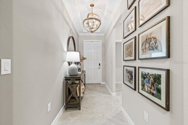 32193 Watoga Loop, Wesley Chapel, FL 33543 - foyer featuring a chandelier, ornamental molding, and light tile patterned flooring