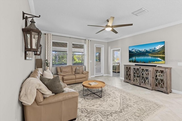 32193 Watoga Loop, Wesley Chapel, FL 33543 - living room featuring ceiling fan, ornamental molding, and tile patterned flooring