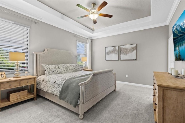 32193 Watoga Loop, Wesley Chapel, FL 33543 - bedroom featuring light colored carpet, a raised ceiling, and ceiling fan