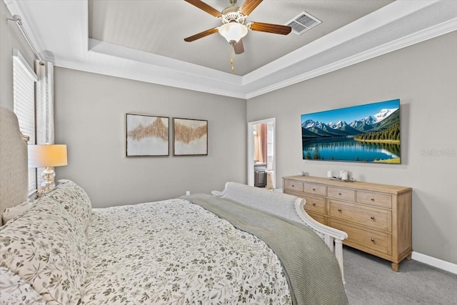 32193 Watoga Loop, Wesley Chapel, FL 33543 - bedroom with a raised ceiling, light colored carpet, crown molding, and ceiling fan
