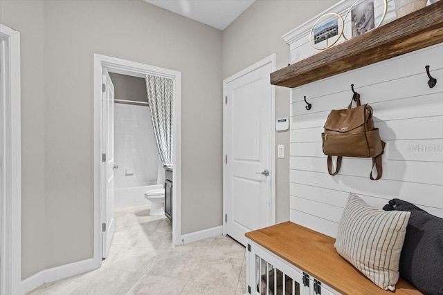 32193 Watoga Loop, Wesley Chapel, FL 33543 - mudroom featuring baseboards and light tile patterned floors