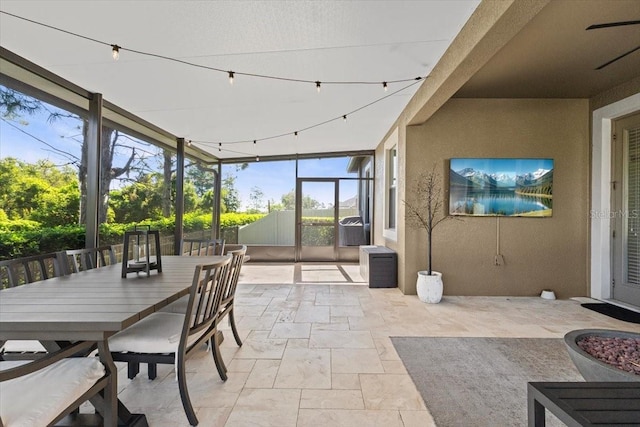 32193 Watoga Loop, Wesley Chapel, FL 33543 - sunroom featuring outdoor dining area