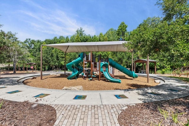 32193 Watoga Loop, Wesley Chapel, FL 33543 - community jungle gym with view of wooded area