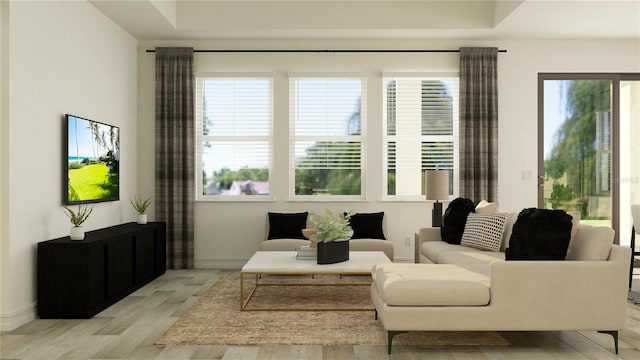 7542 E 117th Ln, Palmetto, FL 34221 - living room featuring light wood finished floors and baseboards