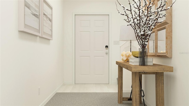 8786 Linked Dr, New Port Richey, FL 34655 - entryway featuring a chandelier, baseboards, and light carpet