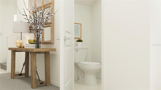 8786 Linked Dr, New Port Richey, FL 34655 - bathroom with toilet, baseboards, and a chandelier