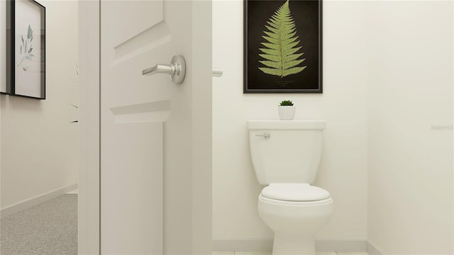 8770 Linked Dr, New Port Richey, FL 34655 - bathroom with toilet and baseboards