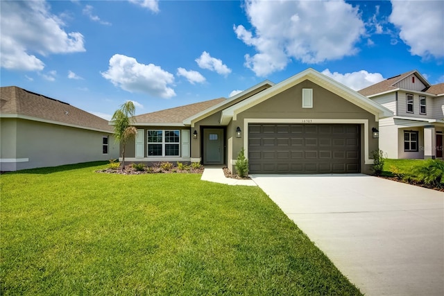 16508 66th Ln E, Parrish, FL 34219 - view of front facade with a garage, stucco siding, a front yard, and concrete driveway