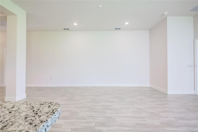 16508 66th Ln E, Parrish, FL 34219 - unfurnished room featuring baseboards, light wood-style floors, and recessed lighting