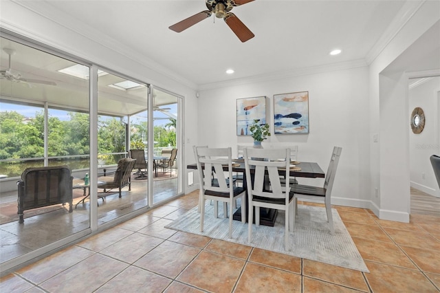 715 45th Ave NE, Saint Petersburg, FL 33703 - tiled dining space with ceiling fan, crown molding, recessed lighting, and a sunroom