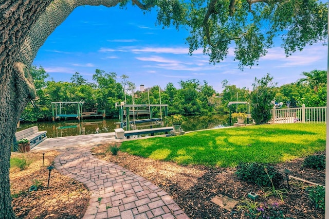 715 45th Ave NE, Saint Petersburg, FL 33703 - view of yard featuring boat lift, a dock, and a water view