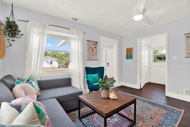 3230 4th Ave S, Saint Petersburg, FL 33712 - living room with wood finished floors, baseboards, and ceiling fan