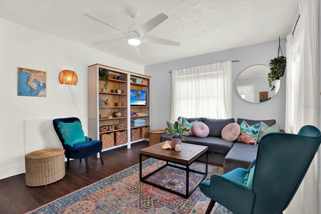 3230 4th Ave S, Saint Petersburg, FL 33712 - living area with wood finished floors, ceiling fan, and a textured ceiling