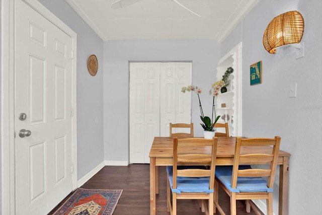 3230 4th Ave S, Saint Petersburg, FL 33712 - dining room featuring dark wood-style flooring, ornamental molding, and baseboards