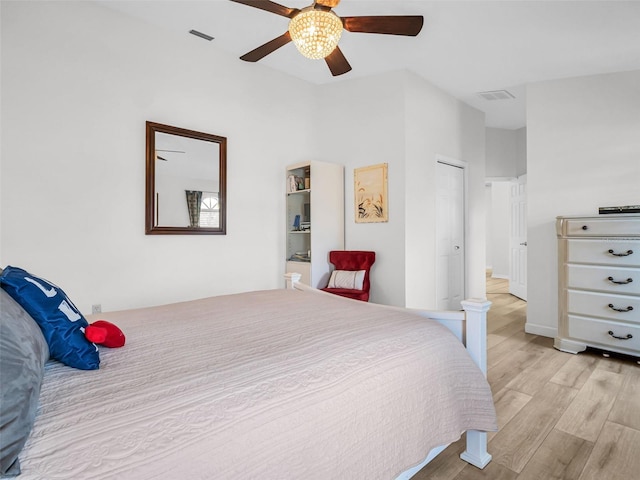 1102 Goshen Rd, Tarpon Springs, FL 34689 - bedroom with light wood-style floors and ceiling fan