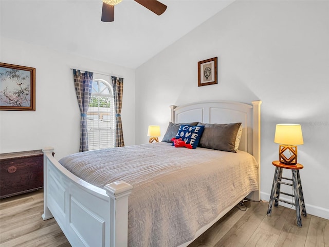 1102 Goshen Rd, Tarpon Springs, FL 34689 - bedroom with lofted ceiling, light wood-type flooring, and ceiling fan