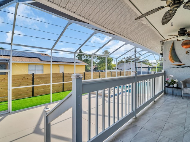 1102 Goshen Rd, Tarpon Springs, FL 34689 - view of patio featuring ceiling fan and a residential view