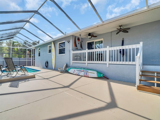 1102 Goshen Rd, Tarpon Springs, FL 34689 - view of pool featuring ceiling fan, a patio area, and glass enclosure