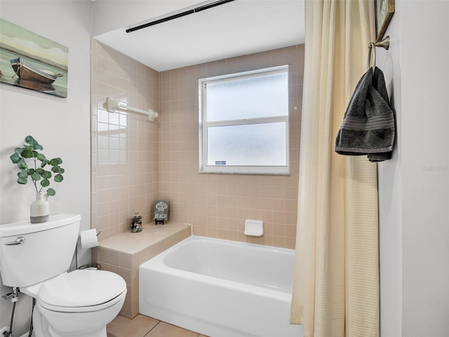 1102 Goshen Rd, Tarpon Springs, FL 34689 - full bath with shower / bath combination with curtain, toilet, and tile patterned flooring