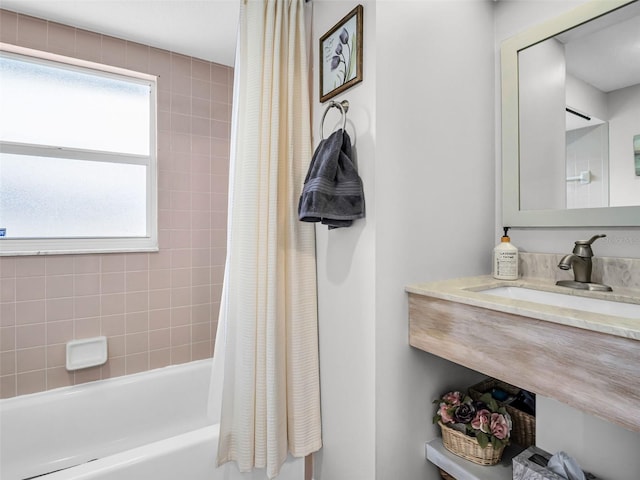 1102 Goshen Rd, Tarpon Springs, FL 34689 - bathroom featuring shower / bath combo with shower curtain and a sink