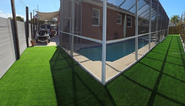 1102 Goshen Rd, Tarpon Springs, FL 34689 - view of pool with glass enclosure and a patio area