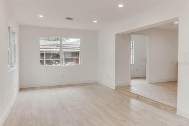 1255 Pine St, Altamonte Springs, FL 32701 - unfurnished room featuring plenty of natural light, wood finished floors, recessed lighting, and baseboards