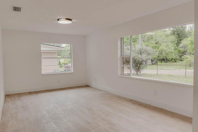 1255 Pine St, Altamonte Springs, FL 32701 - unfurnished room featuring light wood-style floors and baseboards
