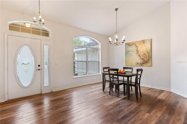 9700 SW 196th Cir, Dunnellon, FL 34432 - foyer with a chandelier, wood-type flooring, lofted ceiling, and baseboards