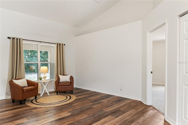 9700 SW 196th Cir, Dunnellon, FL 34432 - living area featuring wood finished floors, lofted ceiling, and baseboards