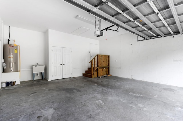9700 SW 196th Cir, Dunnellon, FL 34432 - garage featuring a garage door opener, electric water heater, and concrete block wall