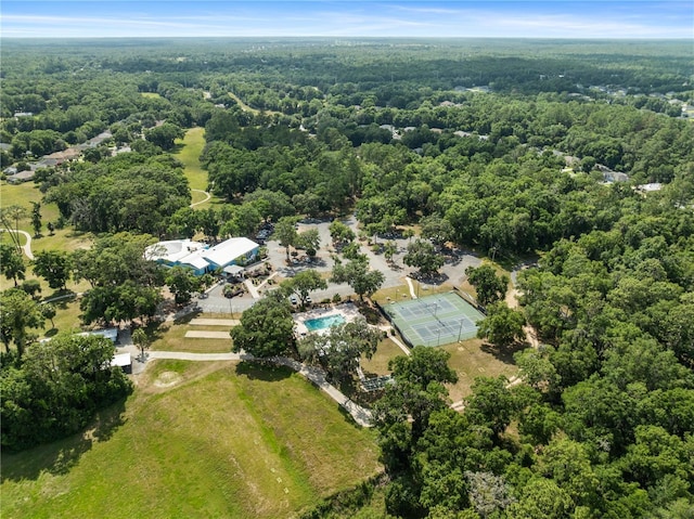 9700 SW 196th Cir, Dunnellon, FL 34432 - aerial view of property and surrounding area with a heavily wooded area
