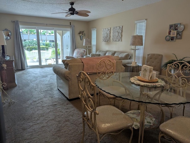 8765 Bardmoor Blvd Unit 108, Seminole, FL 33777 - carpeted dining room featuring a ceiling fan and a textured ceiling