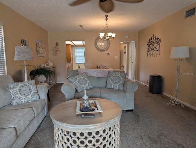 8765 Bardmoor Blvd Unit 108, Seminole, FL 33777 - living area featuring carpet, ceiling fan, a chandelier, baseboards, and a textured ceiling