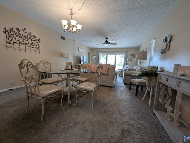 8765 Bardmoor Blvd Unit 108, Seminole, FL 33777 - dining space with a chandelier, a textured ceiling, ceiling fan, and carpet flooring