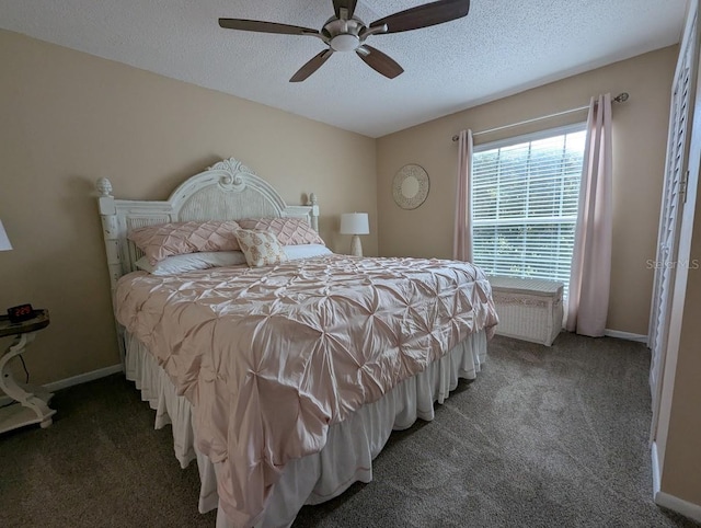 8765 Bardmoor Blvd Unit 108, Seminole, FL 33777 - bedroom featuring carpet flooring, a textured ceiling, ceiling fan, and baseboards