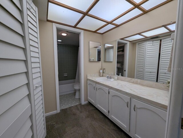 8765 Bardmoor Blvd Unit 108, Seminole, FL 33777 - bathroom featuring toilet, vanity, shower / bathtub combination with curtain, baseboards, and a closet