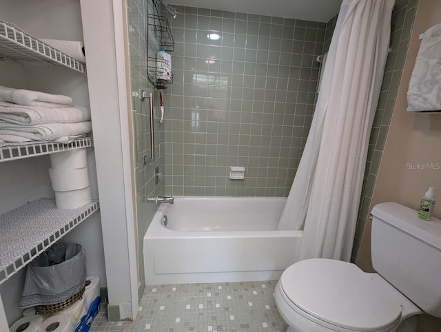 8765 Bardmoor Blvd Unit 108, Seminole, FL 33777 - full bath with shower / bathtub combination with curtain, toilet, and tile patterned floors