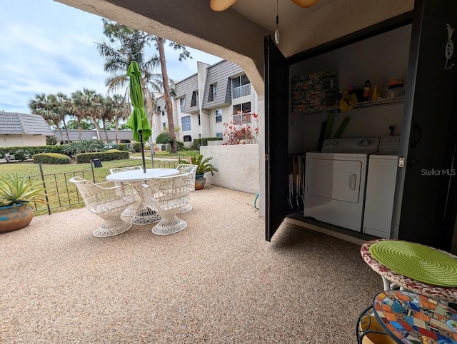 8765 Bardmoor Blvd Unit 108, Seminole, FL 33777 - view of patio / terrace with washing machine and clothes dryer