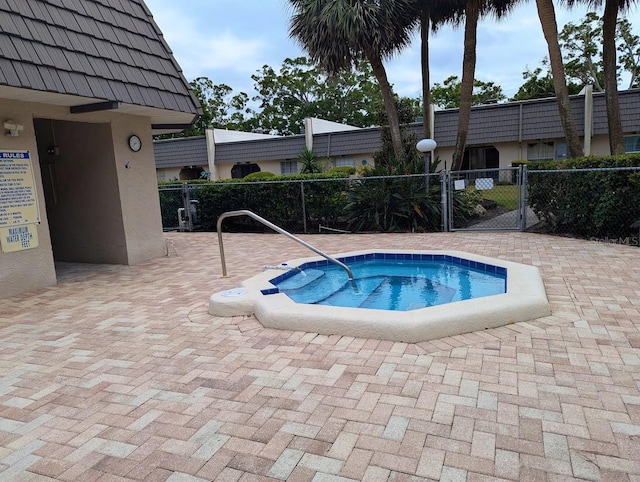 8765 Bardmoor Blvd Unit 108, Seminole, FL 33777 - view of pool featuring a hot tub