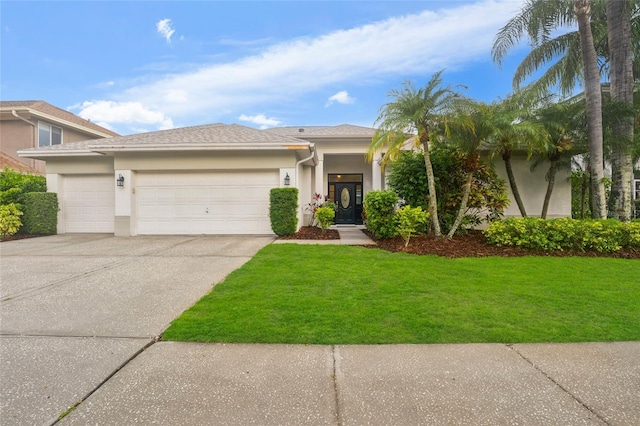 9402 Woodbay Dr, Tampa, FL 33626 - view of front facade featuring stucco siding, a garage, concrete driveway, and a front yard