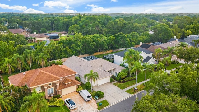 9402 Woodbay Dr, Tampa, FL 33626 - aerial perspective of suburban area featuring a forest