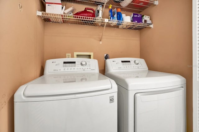 3146 37th Ln S Unit A, Saint Petersburg, FL 33711 - laundry area featuring washing machine and dryer